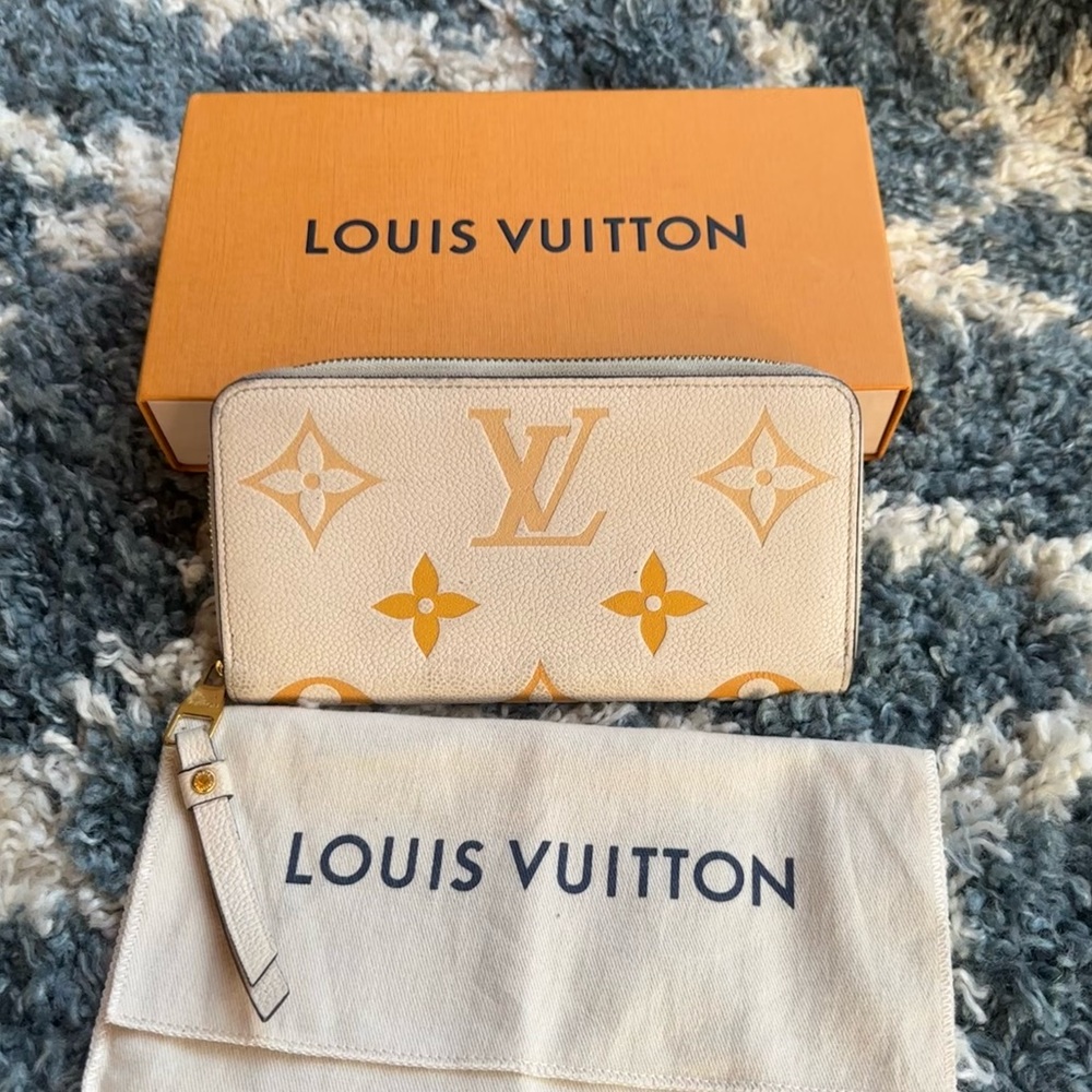 Louis Vuitton Amplant Visor Pool Zippy Wallet Empreinte Leather